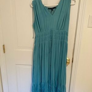 Very pretty Grecian inspired turquoise mid-length dress.